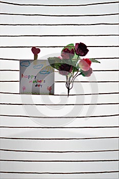 Happy mothers day,colorful flowers , small gift boxes,