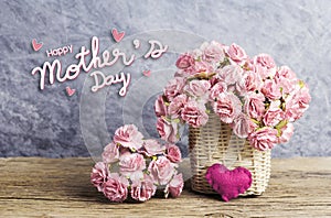 Happy mothers day concept of pink paper carnation flowers