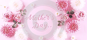Happy mothers day concept, Vintage style of pink roses and beautiful flower frame on pastel background with the text. Flat lay ,