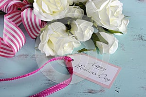 Happy Mothers Day gift of white roses bouquet with pink stripe ribbon and gift tag