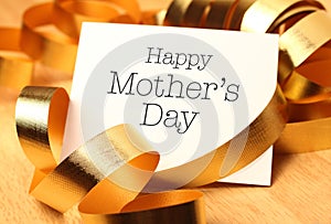 Happy mothers day with gold decoration.