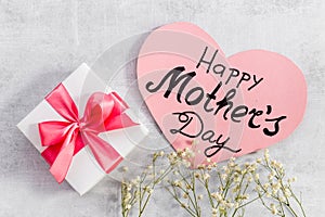 Happy Mothers day greeting card with gift box pink ribbon