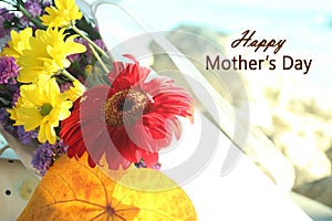 Happy Mothers Day greetings- with beautiful flower bouquet in soft tone background