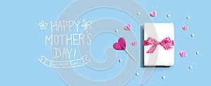 Happy Mothers day message with a gift box and hearts