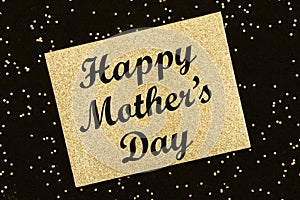 Happy Mothers Day message on gold glitter greeting card