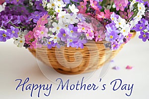 Happy Mothers Day. Mothers Day flowers in the basket