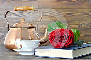 Happy Mothers Day: Red rose, book and cup of tea