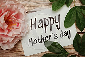 Happy Mothers day typography text on wooden background