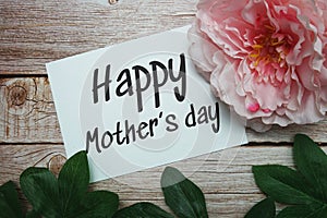 Happy Mothers day typography text on wooden background