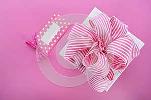 Happy Mothers Day white gift box with pink stripe ribbon.