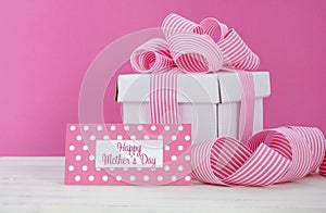 Happy Mothers Day white gift box with pink stripe ribbon.