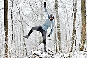 Happy mountain biker in winter