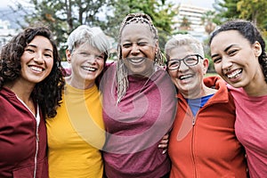 Happy multi generational women having fun together - Multiracial friends smiling on camera after sport workout outdoor - Main