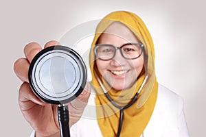 Happy Muslim Female Doctor Hold A Stethoscope