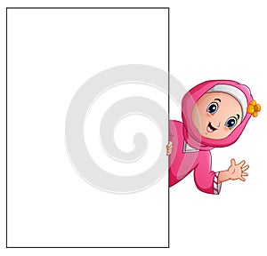 Happy Muslim girl cartoon holding blank sign