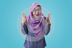Happy Muslim Lady Shows Shocked Surprised Face with Open Mouth