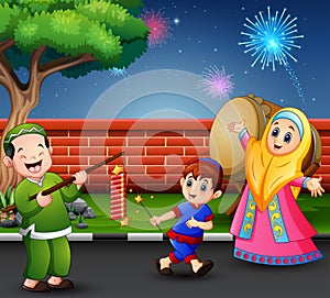 Happy muslim people celebrate for eid mubarak with firecracker