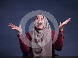 Happy Muslim Woman Shows Winning Gesture Greeting Something