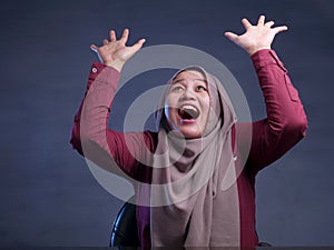 Happy Muslim Woman Shows Winning Gesture Greeting Something