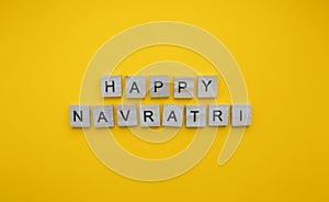 happy Navratri, minimalistic banner with an inscription in wooden letters