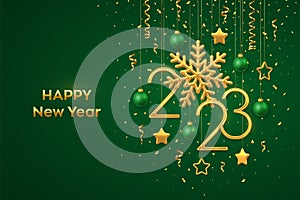 Happy New 2023 Year. Hanging Golden metallic numbers 2023 with shining snowflake and confetti on green background. New Year