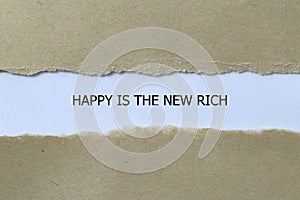 happy is the new rich on white paper