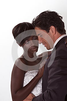 Happy new wed interracial couple in wedding mood