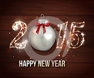 Happy New Year 2015 celebration concept on wooden