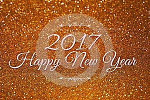 Happy New Year 2017 word on gold glitter background