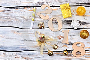 Happy new year 2018 alphabet on wooden background.