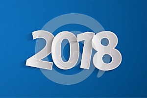 Happy New Year 2018 concept with paper cuted white numbers on blue background