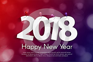 Happy New Year 2018 greeting card concept with paper cuted white numbers