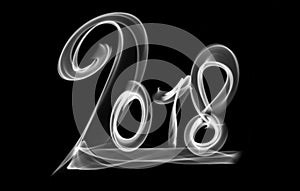 Happy new year 2018 isolated numbers lettering written with fire flame or smoke on black background