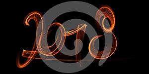 Happy new year 2018 isolated numbers lettering written with fire flame or smoke on black background