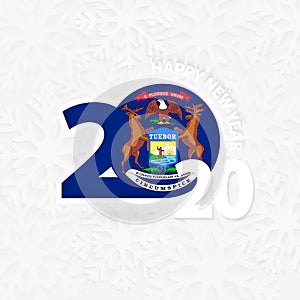 Happy New Year 2020 with flag of US state Michigan on snowflake background