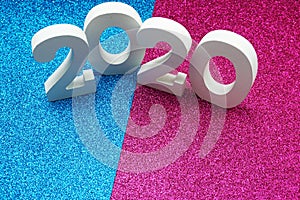 Happy New year 2020 with space copy on pink and blue glitter background