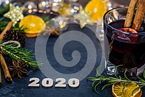 Happy new year 2020 still life concept on dark slate board