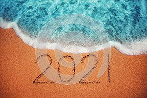 Happy New Year 2021 concept on the sea beach; sunrsie shot