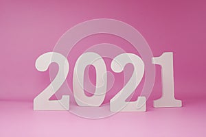 Happy new year 2021 , number wooden object on pink background and copy space - pink new year celebrate concept  - Countdown from 2