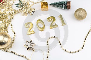 Happy New Year 2021. Sparkling gold numbers on white background with stars. object for design holiday greeting card