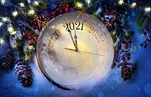 Happy New Year 2021 winter holiday greeting card design. Party poster, banner or invitation background with snow clocks and