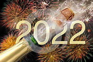 Happy new year 2022 with bottle champagne
