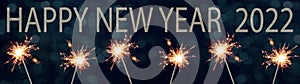 HAPPY NEW YEAR 2022  festive banner greeting card - Many burning sparkler, with blue bokeh light background