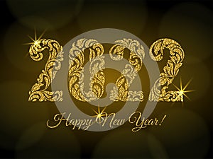 Happy New Year 2022. The figures from a floral ornament with golden glitter and sparks on a dark background with bokeh.