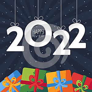 Happy New Year 2022 greeting card. Banner with presents on dark background