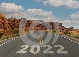 Happy New Year 2022 road to success beautiful desert mountains