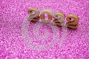 Happy New year 2022 with space copy on purple glitter background