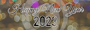 Happy New Year 2023 Bokeh And Blur Shiny Golden Lights Background.