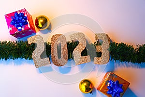 Happy New Year 2023. Golden numbers Christmas white background