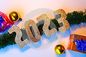 Happy New Year 2023. Golden numbers Christmas white background